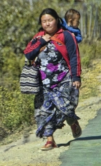 woman and baby on road